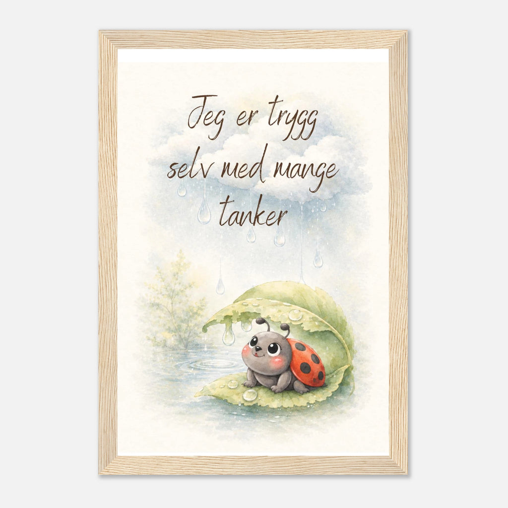 Innrammet veggplakat til barnerom med marihøne og budskap om trygghet